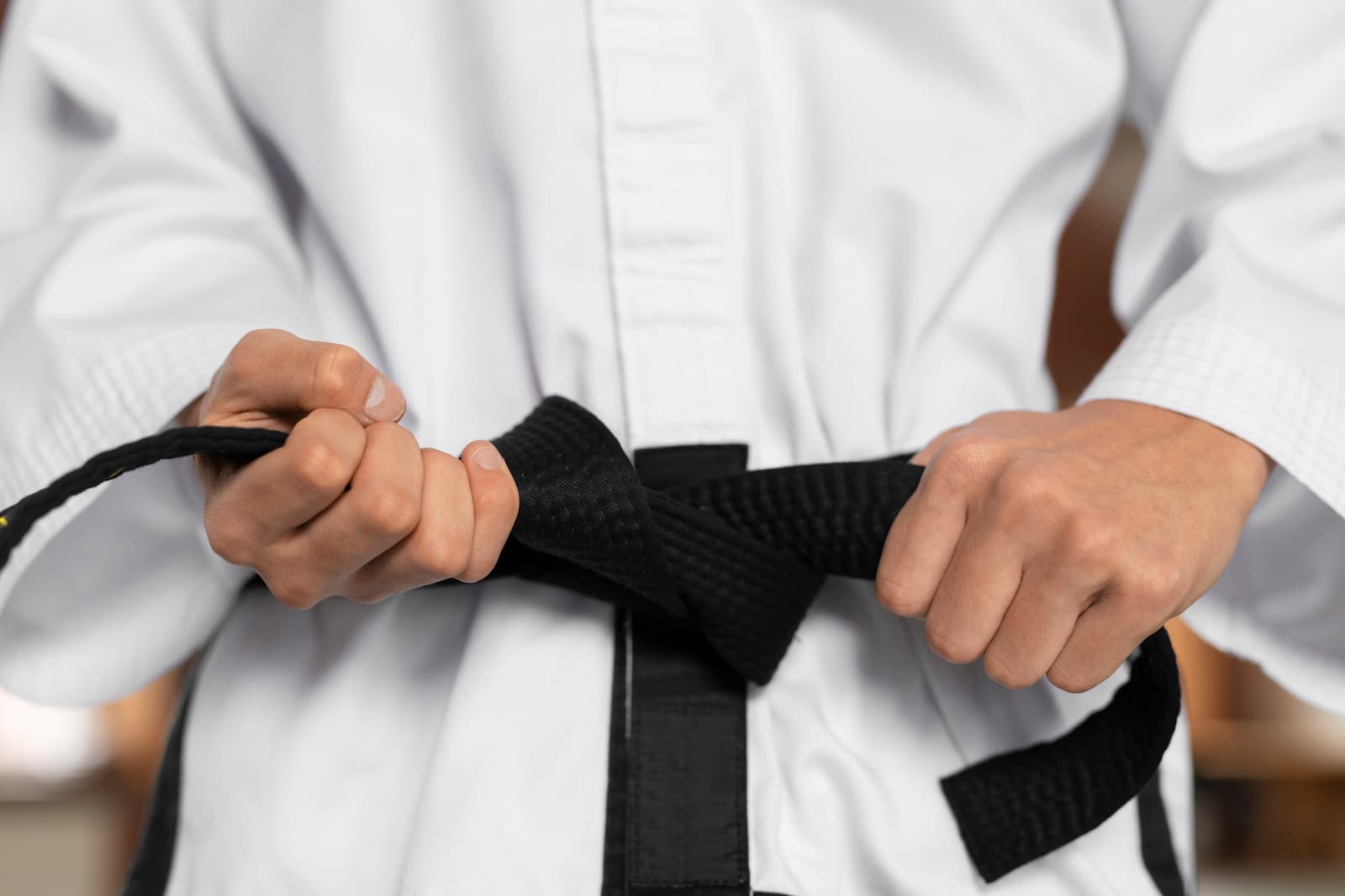 como atar el cinturón de judo